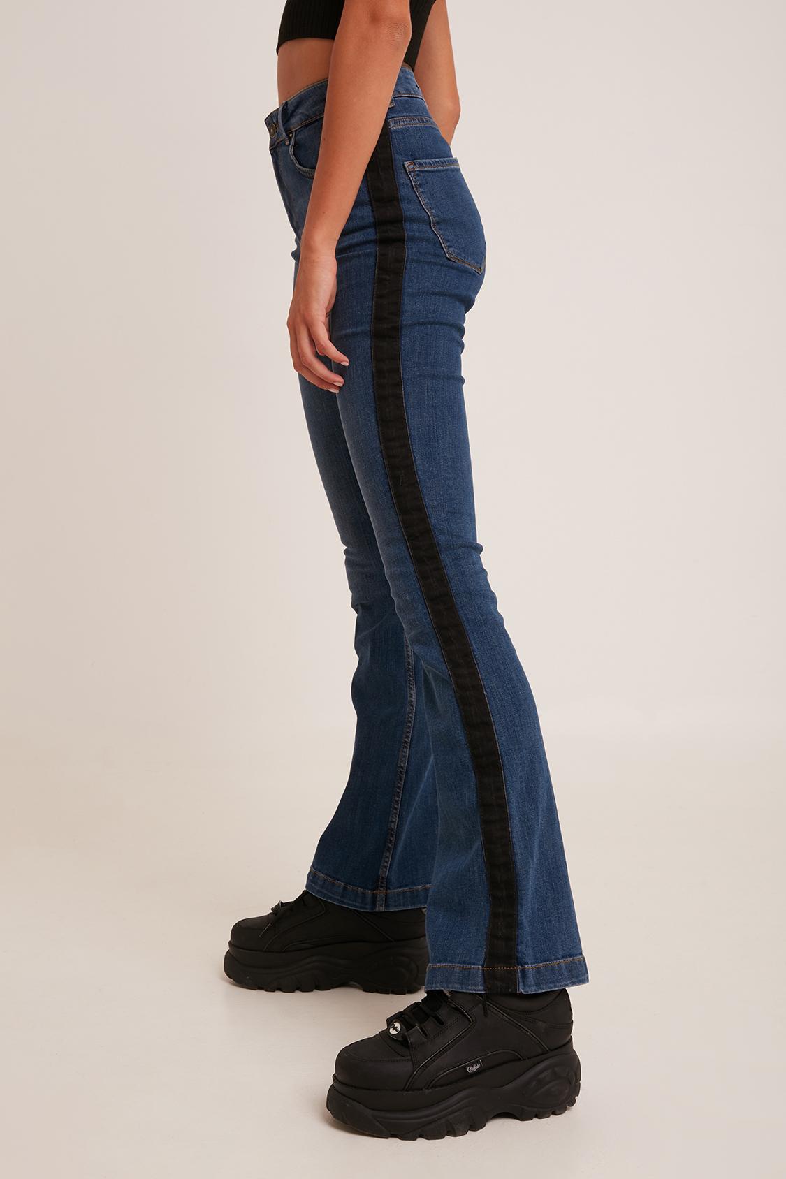 Flared jeans with stripe